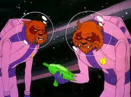 two cat aliens looking at the weapon