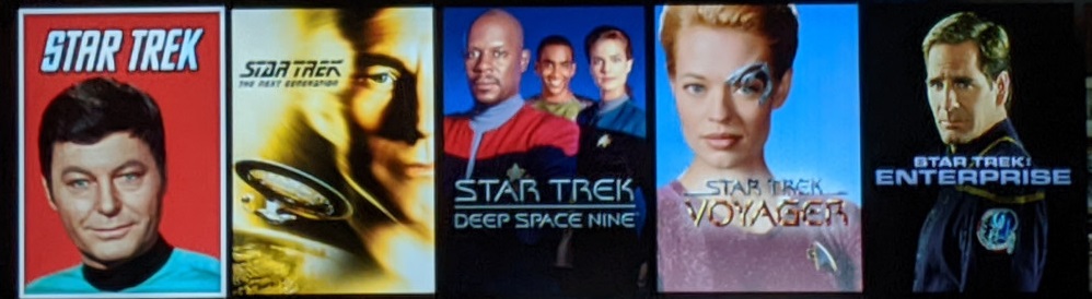 from left to right, Star Trek, TNG, DS9, Voyager, and Enterprise