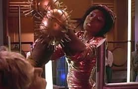 Yareena with the spike thing on her hand