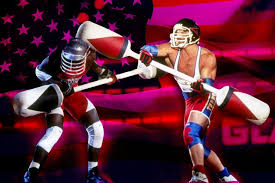 from the show American Gladiators, two men knocking each other over with barbells