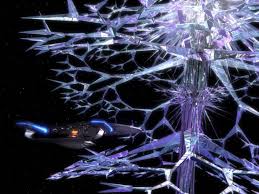 an image of the crystalline entity with the Enterprise-D in the background.