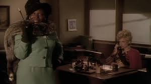 Whoopi Goldberg in the Dixion Hill simulation and Dixon's secretary in the opening scene.