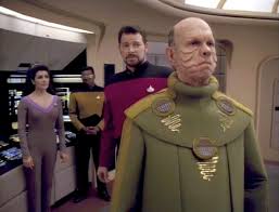 La Forge, RIker, Troi, and Dokachin