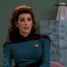Troi in her Starfleet uniform