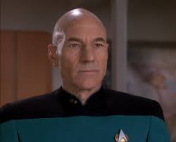 Picard in a blue uniform