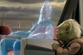 Yoda sitting next to a hologram in the Jedi temple during a council meeting