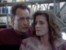 Q and Vash sitting next to each other