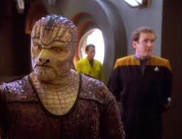 O'Brien and Tosk in the background.