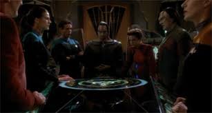 The gang at ops including Dukat, Kira, Bashir, Dax, and Garak