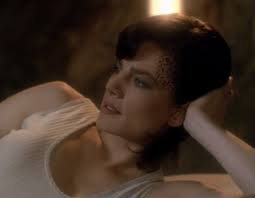 Mirror Dax lies on the bed