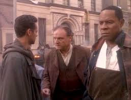 Bashir, Webb, and Sisko on the streets of the district.
