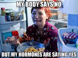 "My body says no, but my hormones say yes", a woman crying while eating a lot of food.