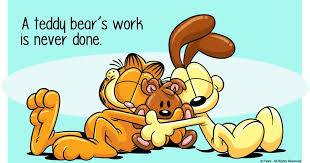 A teddy bear's work is never done - Garfield and Odie