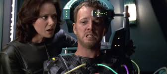 Alice in the background while Paris is hooked into the ship