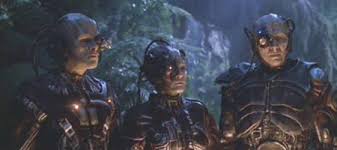 the three drones in the flashback around the fire.