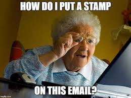 Old lady looking at computer... "How do I put a stamp on this email?"
