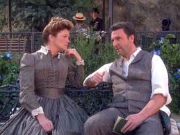 Janeway and Michael Sullivan siting on a bench.