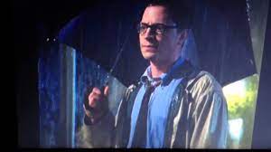 Jeremy holding an umbrella